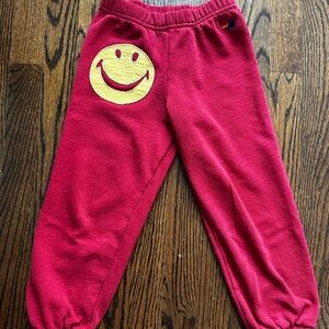 Aviator Nation Kids Red Joggers with Yellow Smiley